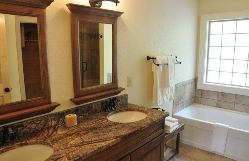 Cabin bathroom at Great Smokys Cabin Rentals.