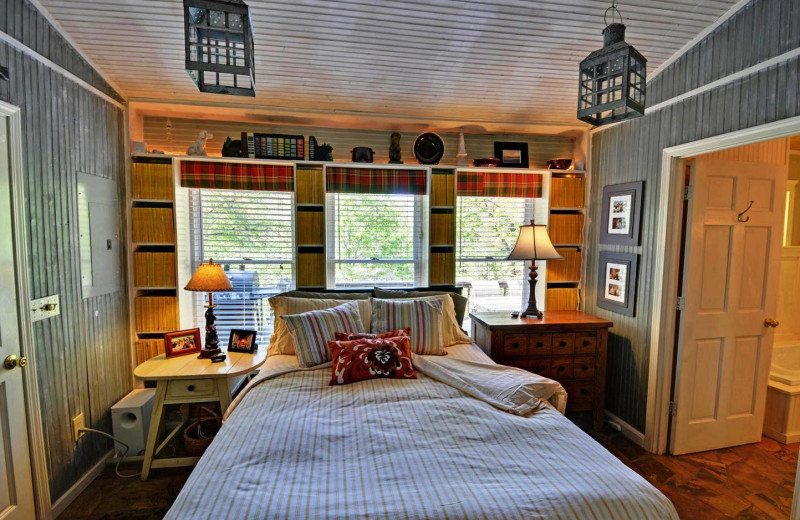 Cabin bedroom at Sliding Rock Cabins.