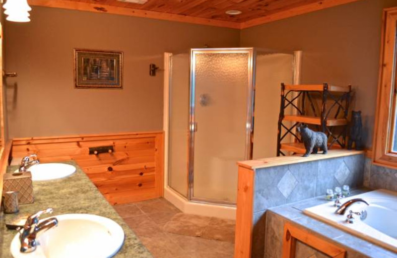 Cabin bathroom at Mountain Getaway Cabin Rentals.