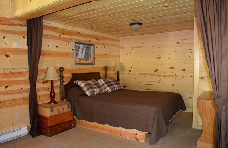 Cabin bedroom at Backroads Inn and Cabins.