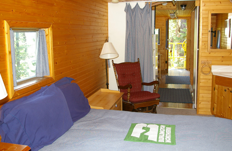 Caboose bedroom at Izaak Walton Inn.