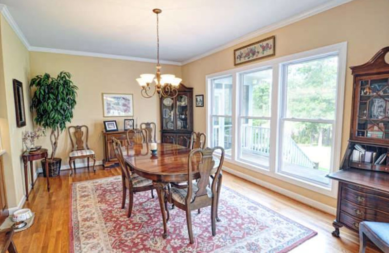 Vacation rental dining room at Century 21 Action Inc.