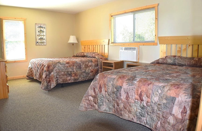 Cabin bedroom at Canary Beach Resort.