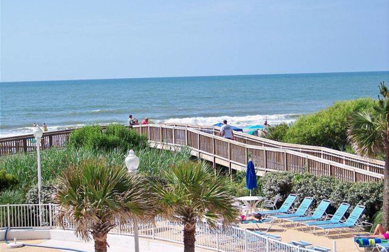 Vacation rental poolside and beach at Myrtle Beach Vacation Rentals.