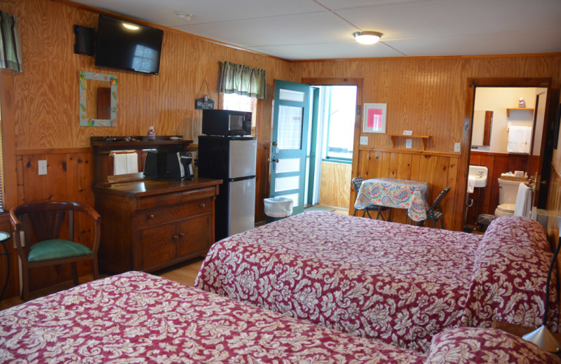 Cottage bedroom at Channel Waterfront Cottages.