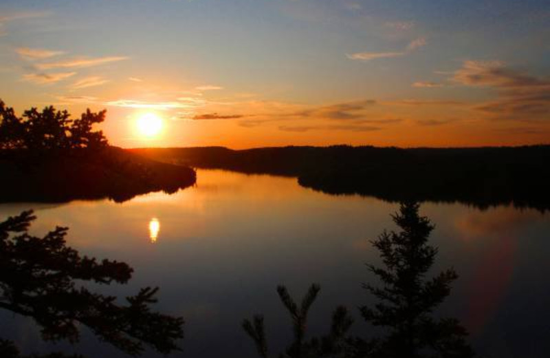 Sunset over lake at Golden Eagle Lodge.