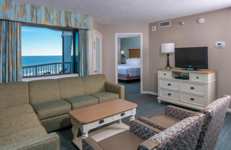 Guest suite living room at The Strand Resort Myrtle Beach.