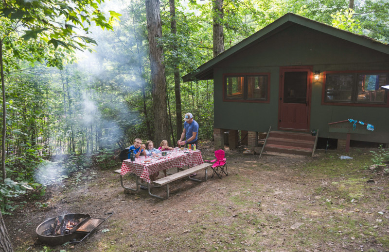 Cabin exterior at Yogi Bear's Jellystone Park™ Camp-Resort: Golden Valley, NC.

