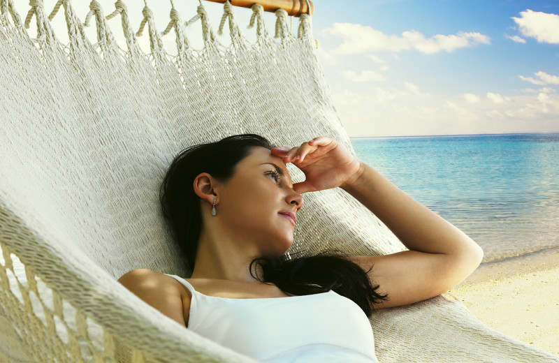 Relaxing on beach near Sanatra Inn.