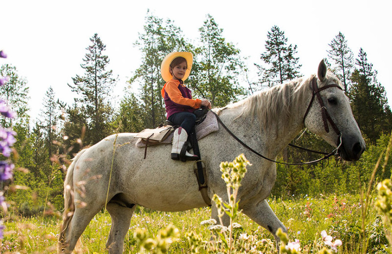 Horseback riding at Triangle X Ranch.