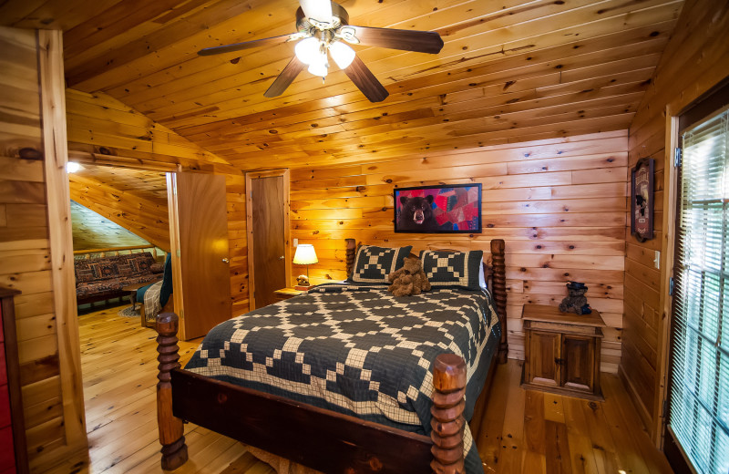 Cabin bedroom at Kiamichi Country Cabins.