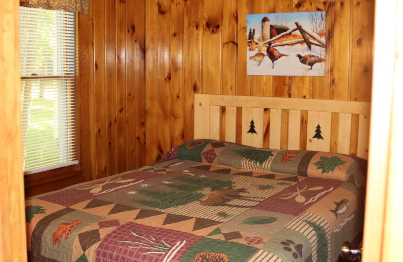 Cabin bedroom at Timber Trails Resort.