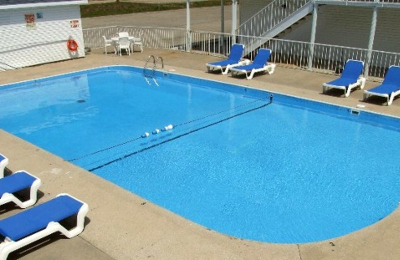 Outdoor pool at AmazInn & Suites.