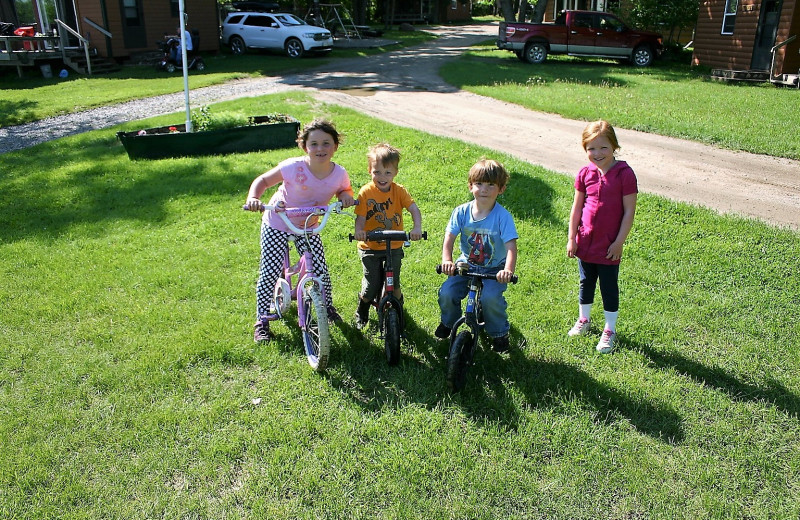 Kids on bikes at Timber Trails Resort.