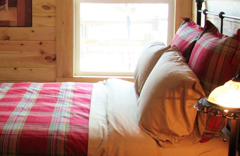 Cabin bedroom at Nelson Lake Lodge.