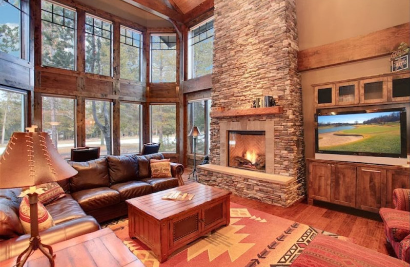 Vacation rental fireplace living room at Vacasa Rentals Sunriver.