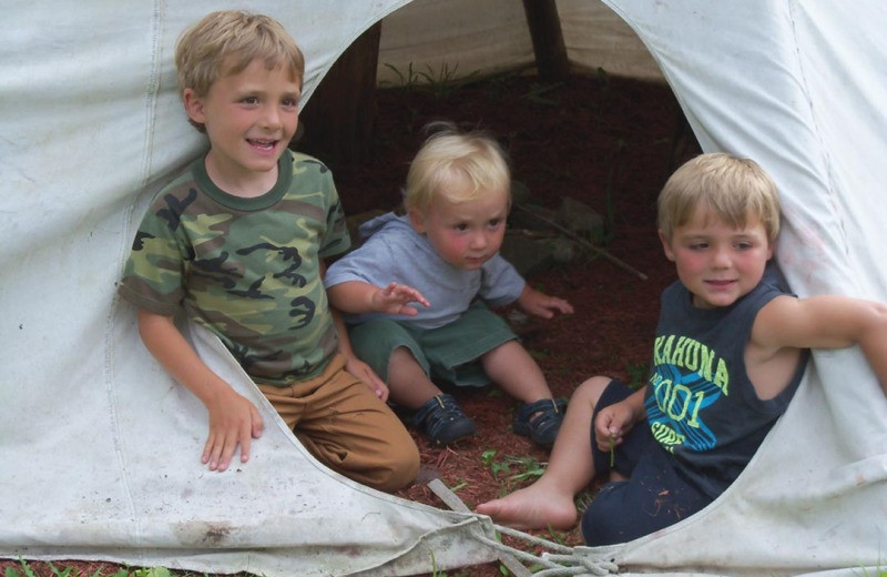 Kids in teepee at Grant's Camps.