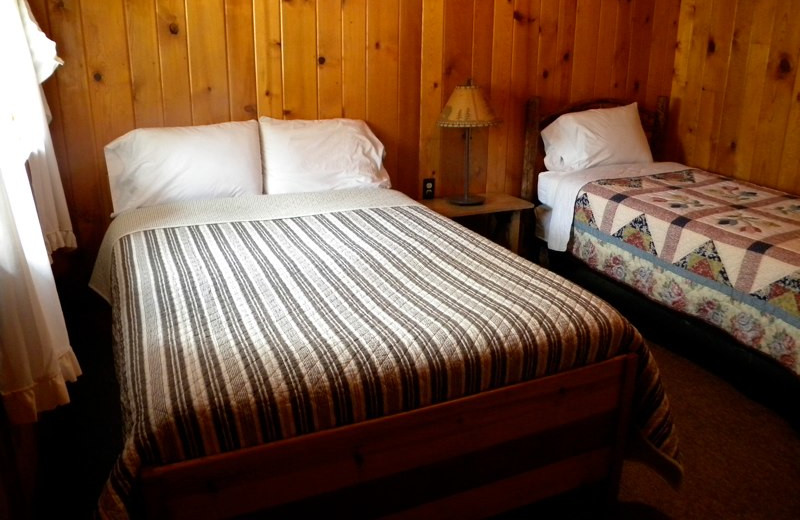 Cabin bedroom at Trail Shop Restaurant and Inn.