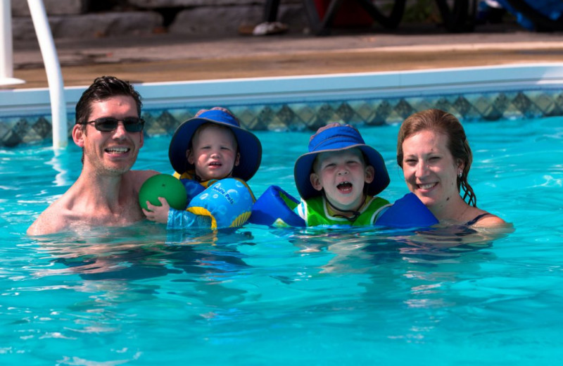 Family in pool at Great Blue Resorts- Lantern Bay Resort.