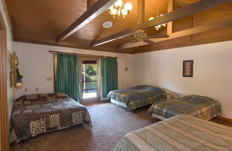 Cottage bedroom at Norfork Resort & Trout Dock.