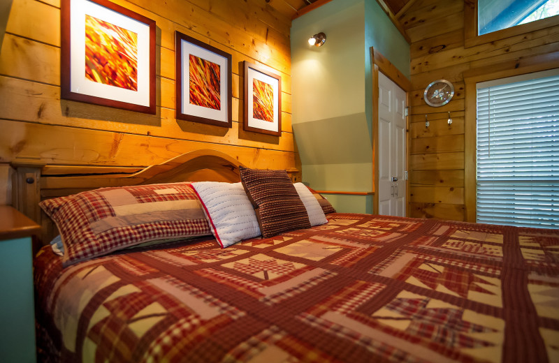 Cabin bedroom at Kiamichi Country Cabins.