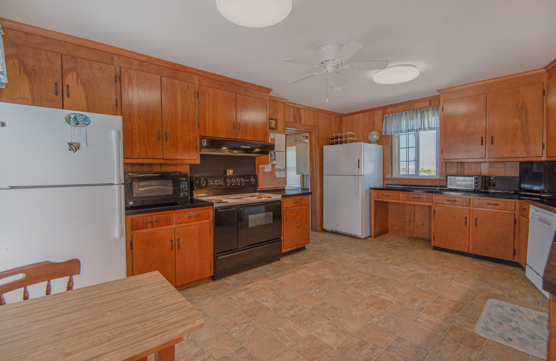 Rental kitchen at Joe Lamb Jr. & Associates Vacation Rentals.