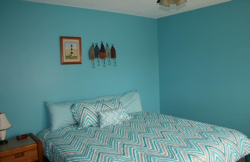 Cabin bedroom at White Wing Resort on Table Rock Lake.