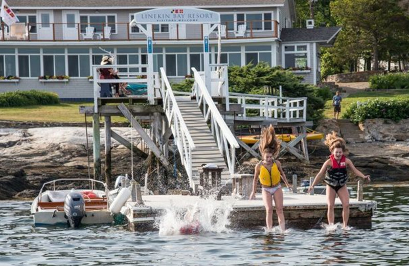 Kids jumping in water at Linekin Bay Resort.