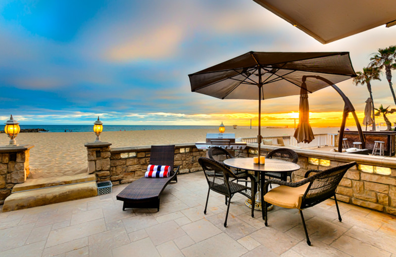 Rental patio on beach at Seabreeze Vacation Rentals, LLC-Orange County.