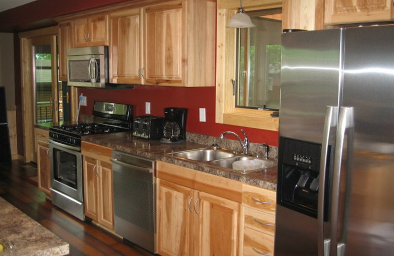 Cabin kitchen at Finn'n Feather Resort.