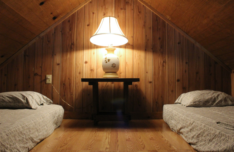 Cabin bedroom at Berry Creek Cabins.