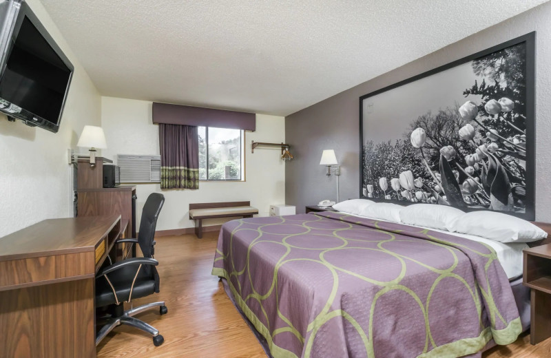 Guest room at Super 8 by Wyndham Zanesville.