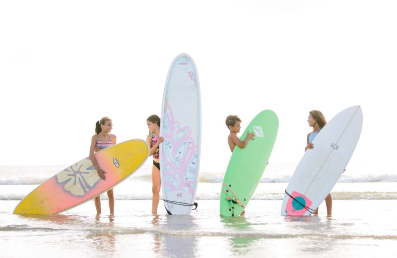 Surfing at Bald Head Island Limited.