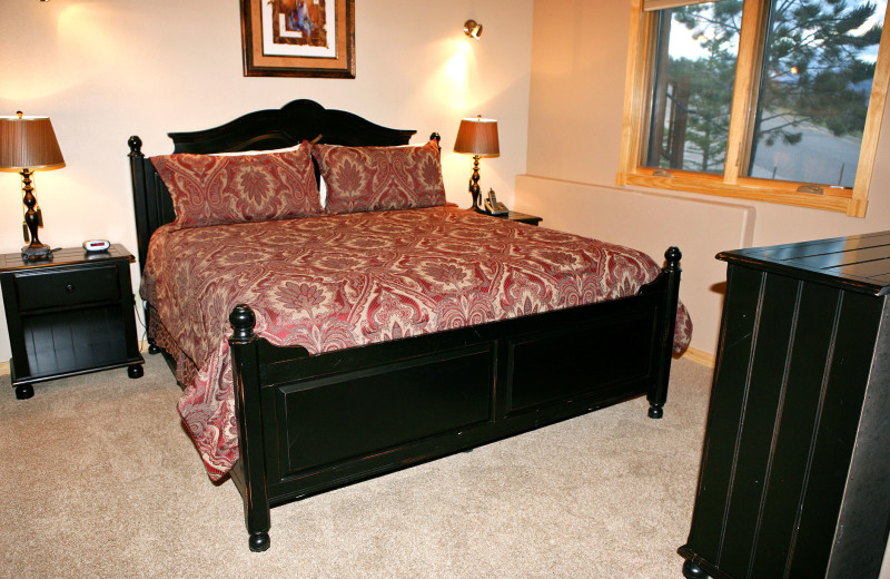 Vacation rental bedroom at Marys Lake Vacation Condos.