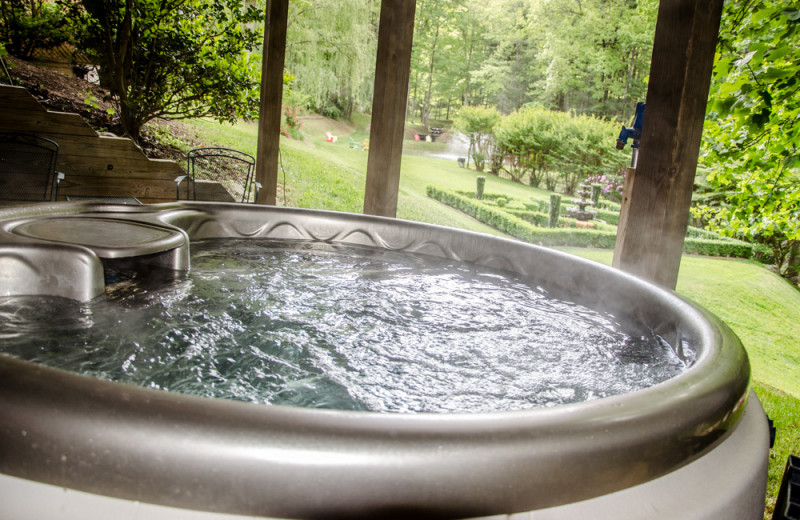 Cabin hot tub at Asheville Cabins of Willow Winds.