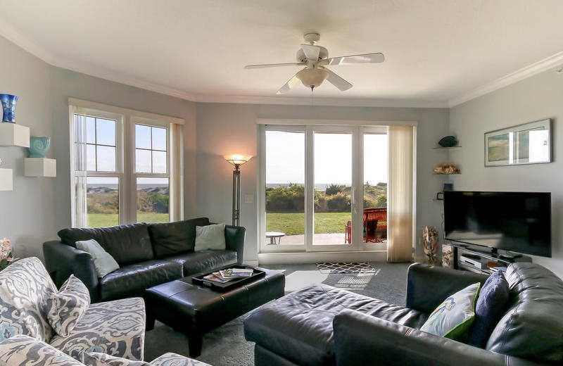 Rental living room at Amelia Rentals and Management Services.