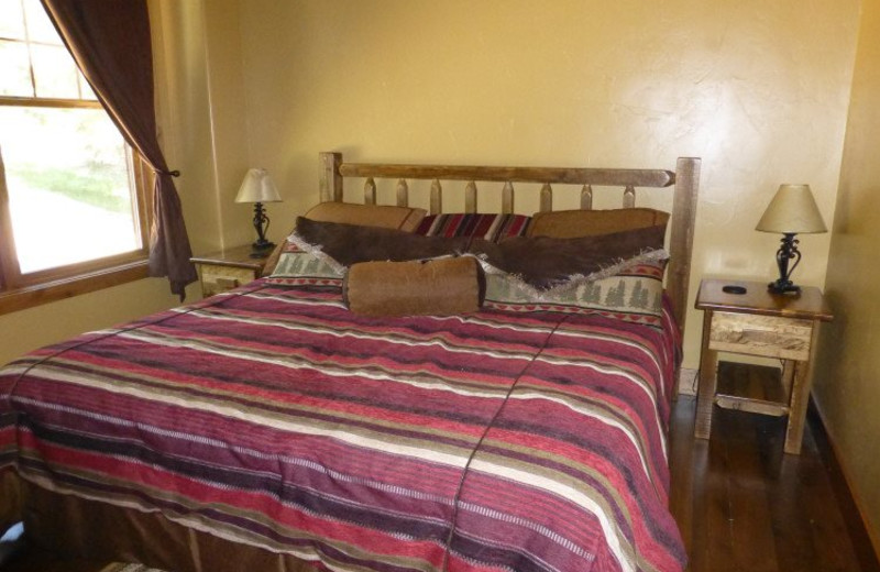 Cabin bedroom at Deadwood Connections.