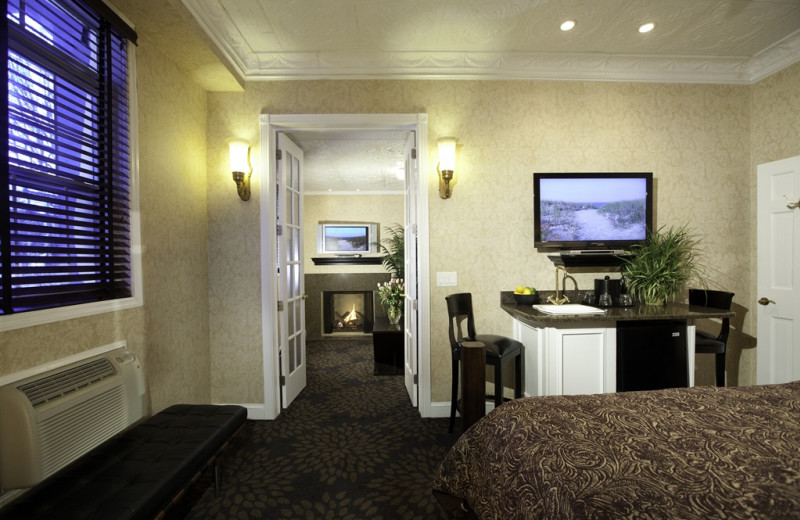 Guest room at The Chateau Inn & Suites.
