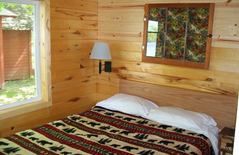 Cabin bedroom at Cedar Point Resort.