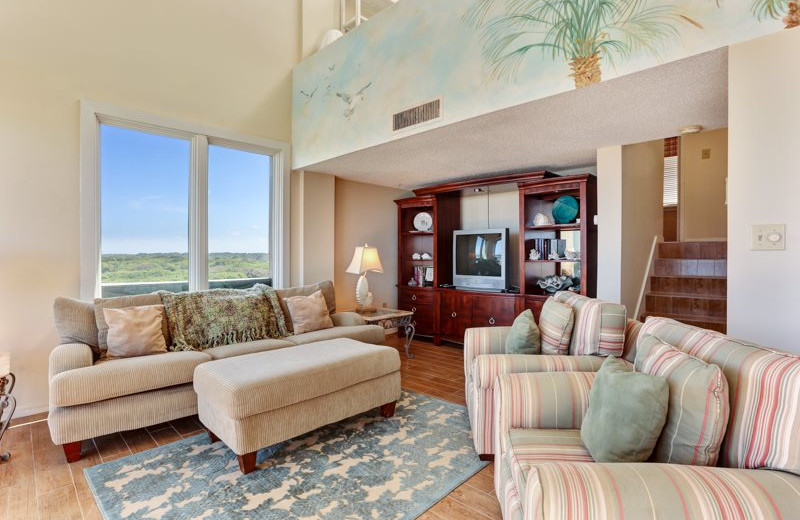 Rental living room at Amelia Rentals and Management Services.