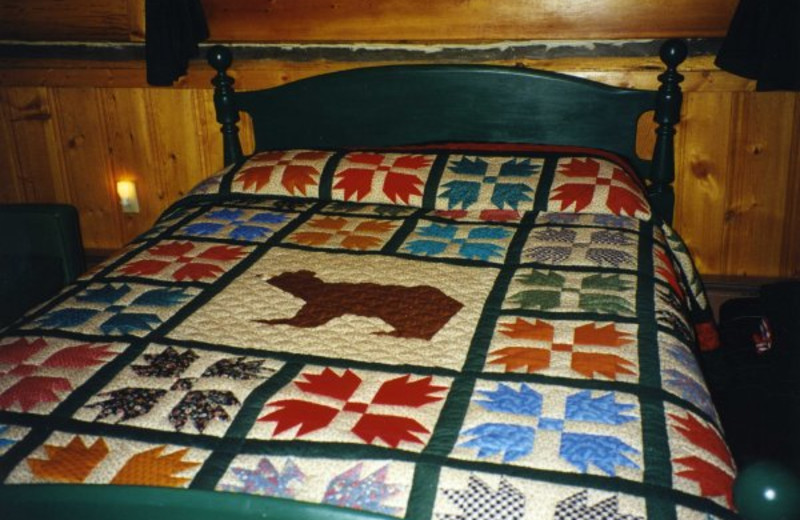 Traditional Log Beds at Nine Quarter Circle Ranch