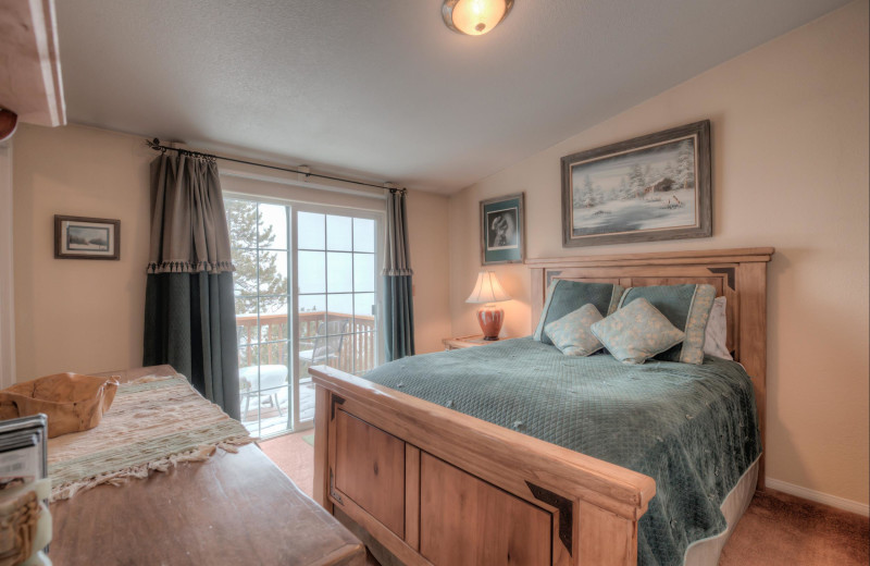 Cabin bedroom at Black Wolf Lodging.