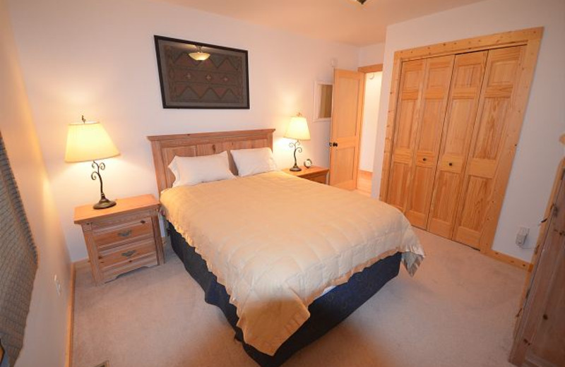 Rental bedroom at Visit Up North Vacation Rentals.