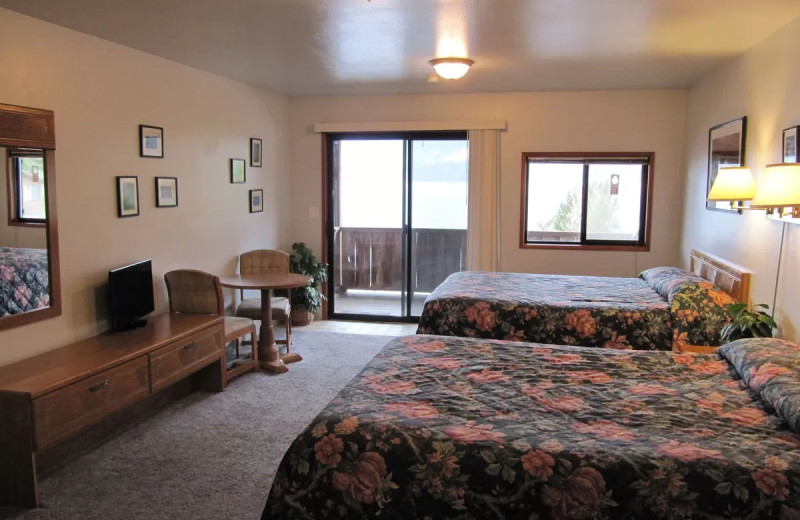 Cabin bedroom at Rain Forest Resort Village.