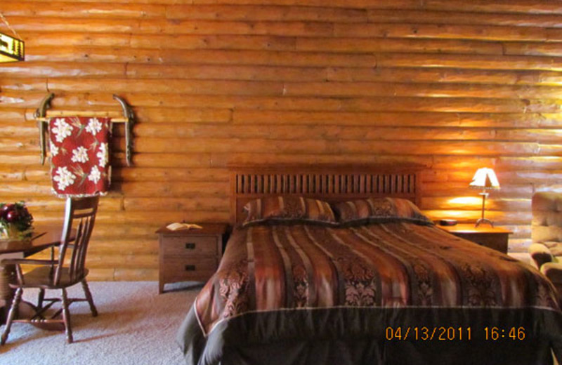 Cabin Bedroom at Cedar Lodge & Settlement