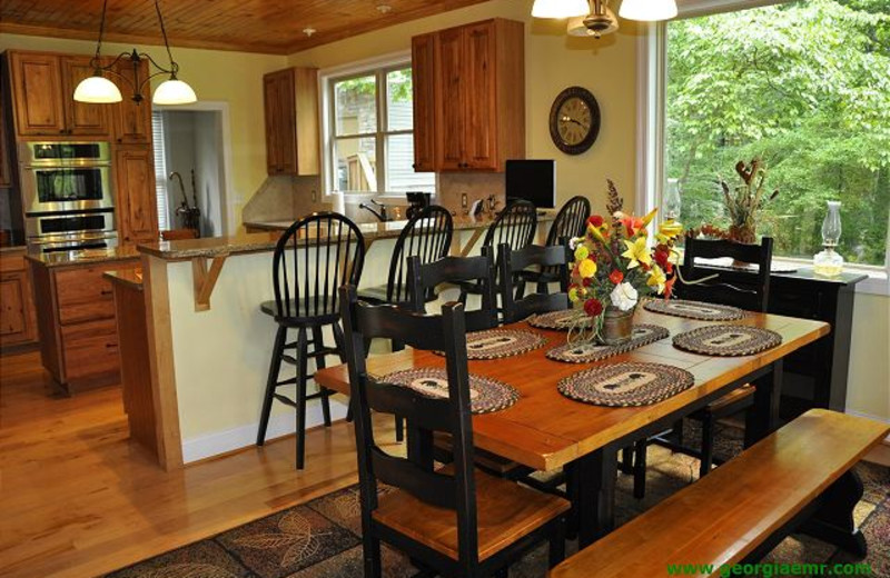 Rental kitchen and dining room at Enchanted Mountain Retreats, Inc.