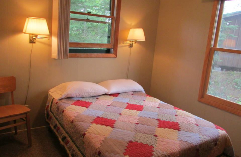 Cabin bedroom at Elbow Lake Lodge.