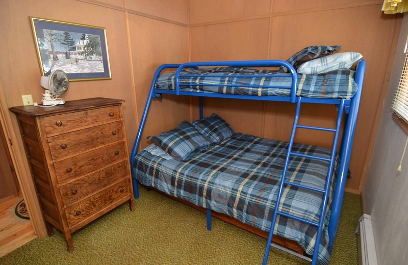 Cabin bedroom at North Country Vacation Rentals.