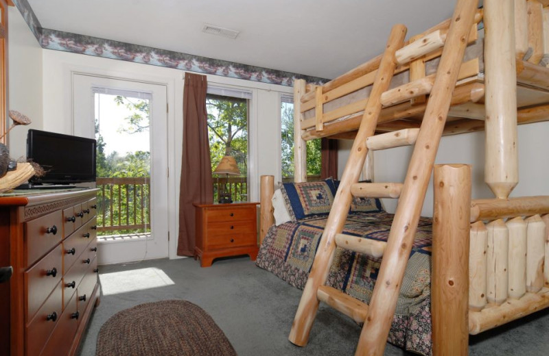 Cabin bedroom at Fireside Chalets & Cabin Rentals.