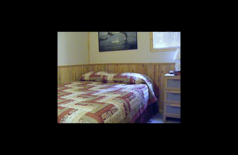 Cabin bedroom at Cheechako Cabins.